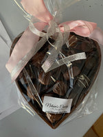 Princess size solid chocolate heart full of soft center creams